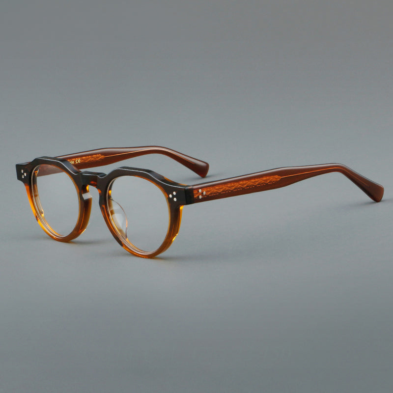 
Montura de gafas vintage redondas de acetato con puente de cerradura y detalle de tres remaches