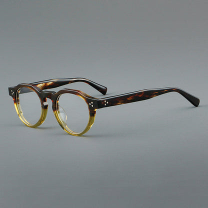 
Montura de gafas vintage redondas de acetato con puente de cerradura y detalle de tres remaches - Imagen 7