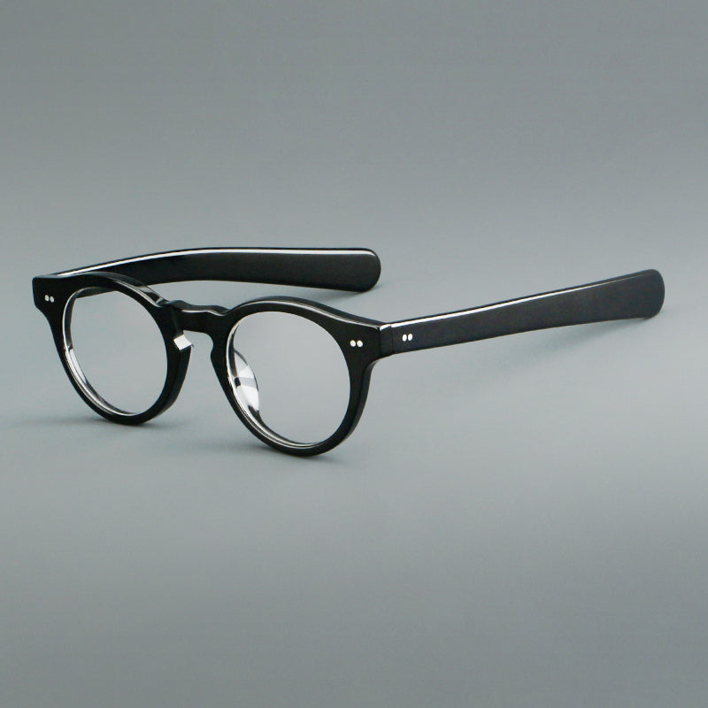 
Monturas de gafas redondas de acetato con aros gruesos y varillas anchas rectas
