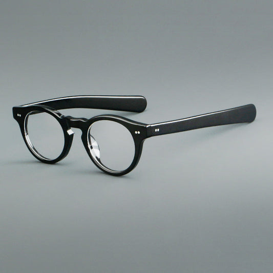 Monturas de gafas redondas de acetato con aros gruesos y varillas anchas rectas