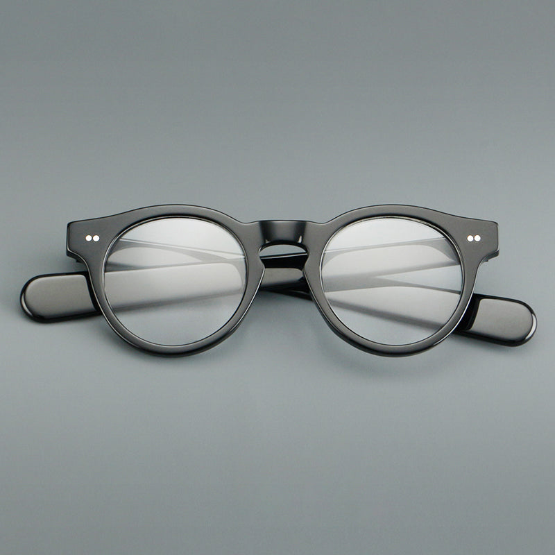 
Monturas de gafas redondas de acetato con aros gruesos y varillas anchas rectas