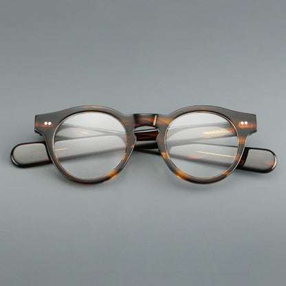 
Monturas de gafas redondas de acetato con aros gruesos y varillas anchas rectas - Imagen 7