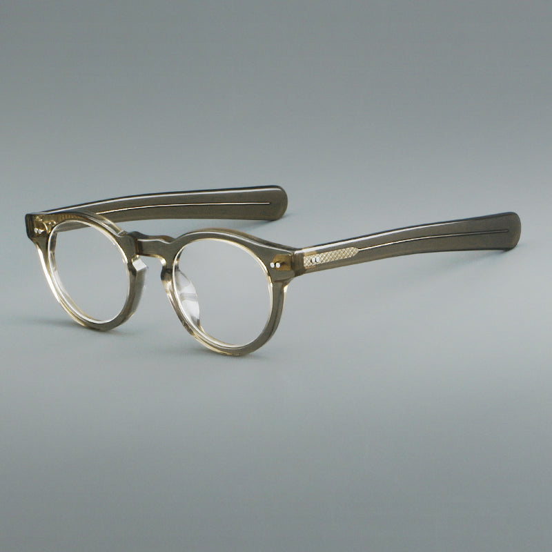 
Monturas de gafas redondas de acetato con aros gruesos y varillas anchas rectas