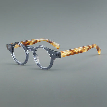 
Monturas de gafas geométricas redondas de acetato con esquinas angulares y detalle de remaches - Imagen 2