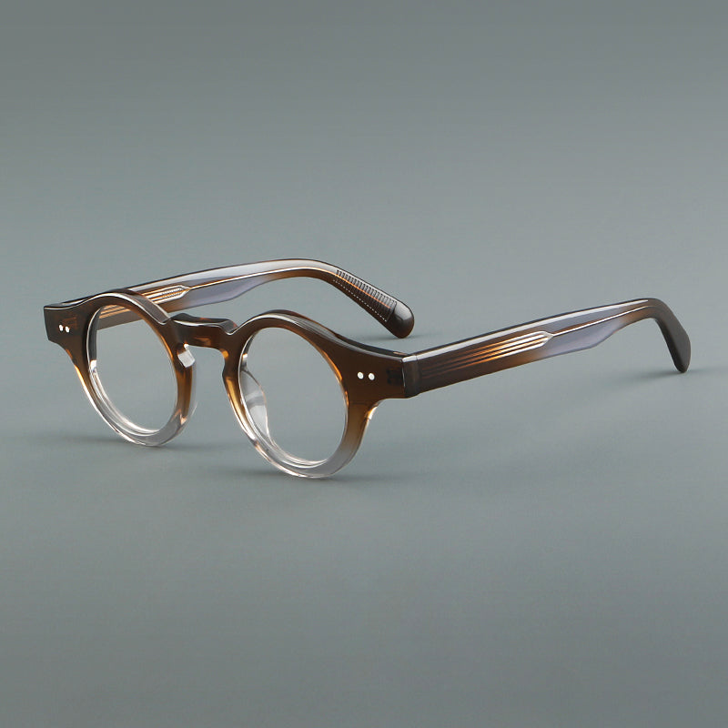 
Monturas de gafas geométricas redondas de acetato con esquinas angulares y detalle de remaches