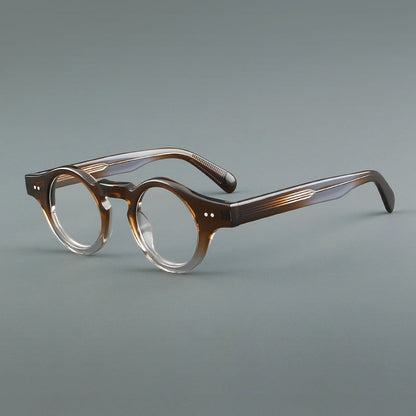 
Monturas de gafas geométricas redondas de acetato con esquinas angulares y detalle de remaches - Imagen 3