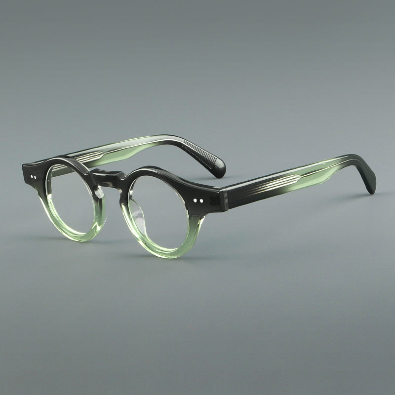 
Monturas de gafas geométricas redondas de acetato con esquinas angulares y detalle de remaches