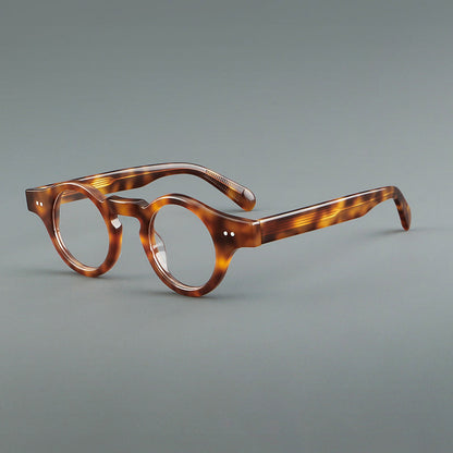 
Monturas de gafas geométricas redondas de acetato con esquinas angulares y detalle de remaches - Imagen 5