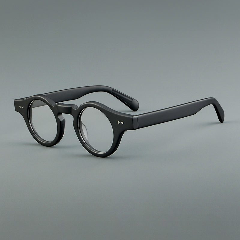 
Monturas de gafas geométricas redondas de acetato con esquinas angulares y detalle de remaches - Negro