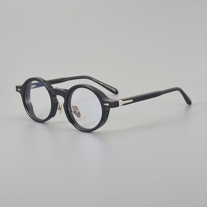 
Monturas de gafas retro de acetato estilo panto, con aros completos redondeados y almohadillas nasales