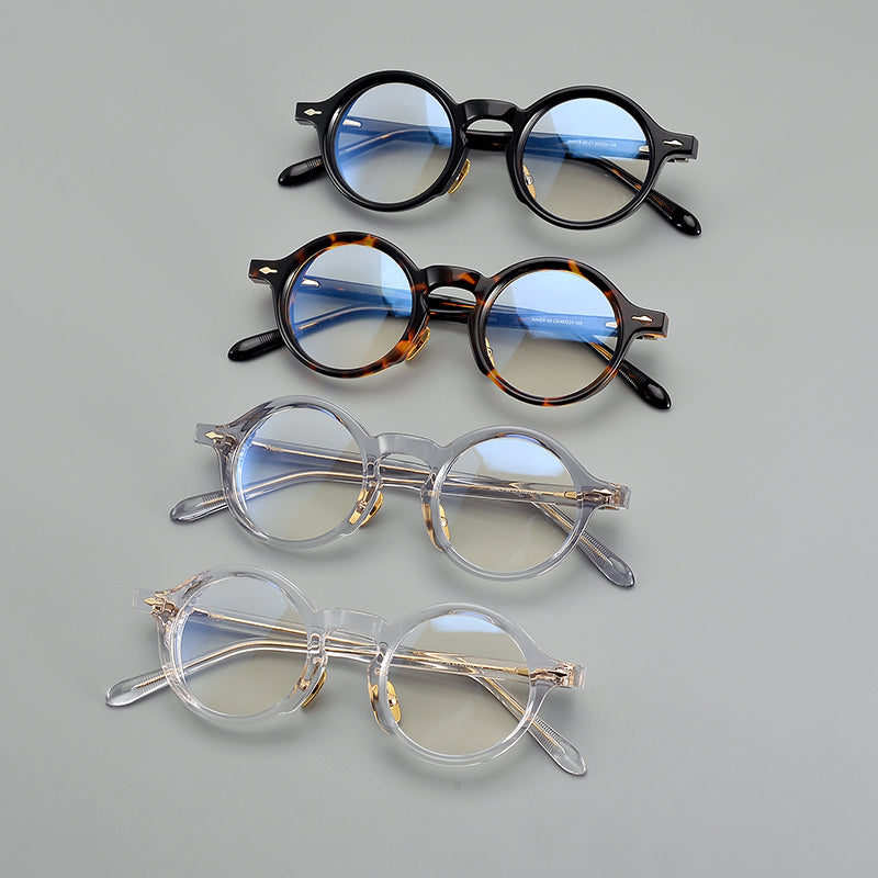 
Monturas de gafas retro de acetato estilo panto, con aros completos redondeados y almohadillas nasales