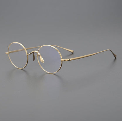 
Monturas de gafas redondas de titanio con aros de alambre fino y varillas metálicas delgadas - Imagen 5