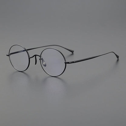 
Monturas de gafas redondas de titanio con aros de alambre fino y varillas metálicas delgadas - Imagen 10