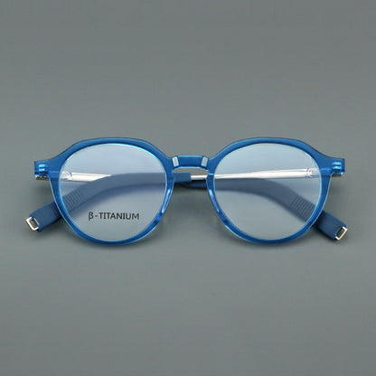 
Monturas de gafas redondas de aleación de titanio con borde superior esculpido y puente metálico - Imagen 2