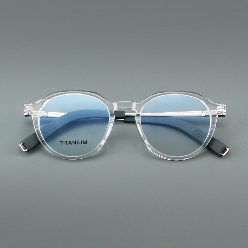 
Monturas de gafas redondas de aleación de titanio con borde superior esculpido y puente metálico - Imagen 5