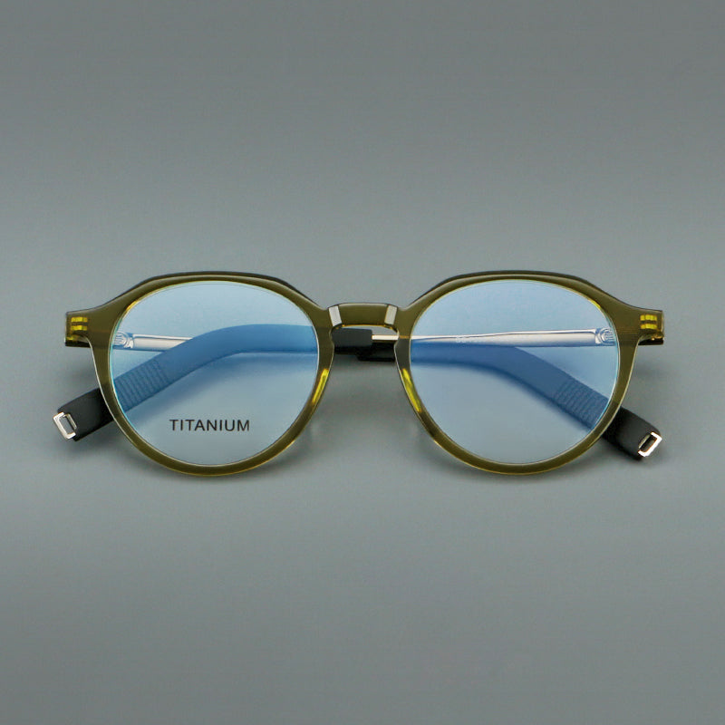 
Monturas de gafas redondas de aleación de titanio con borde superior esculpido y puente metálico - Imagen 7