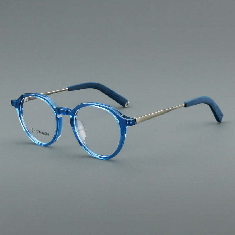 
Monturas de gafas redondas de aleación de titanio con borde superior esculpido y puente metálico - Azul y plateado