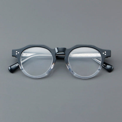 
Monturas de gafas redondas retro de acetato con puente de cerradura elevado y remaches en las esquinas - Imagen 2