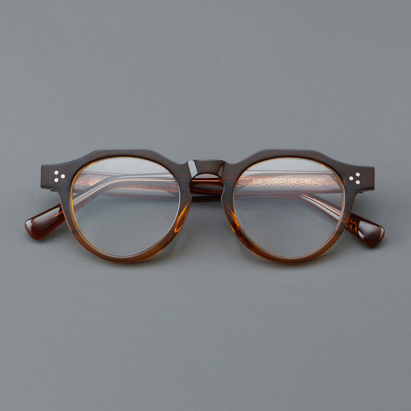 
Monturas de gafas redondas retro de acetato con puente de cerradura elevado y remaches en las esquinas - Marrón