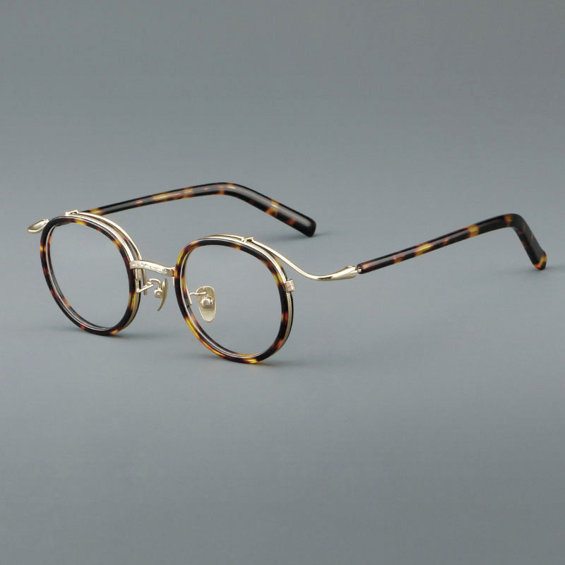 
Montura de gafas redondas retro de acetato con puente de metal fino y detalles laterales - Carey Ámbar y Dorado