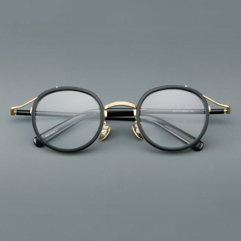 
Montura de gafas redondas retro de acetato con puente de metal fino y detalles laterales - Imagen 5