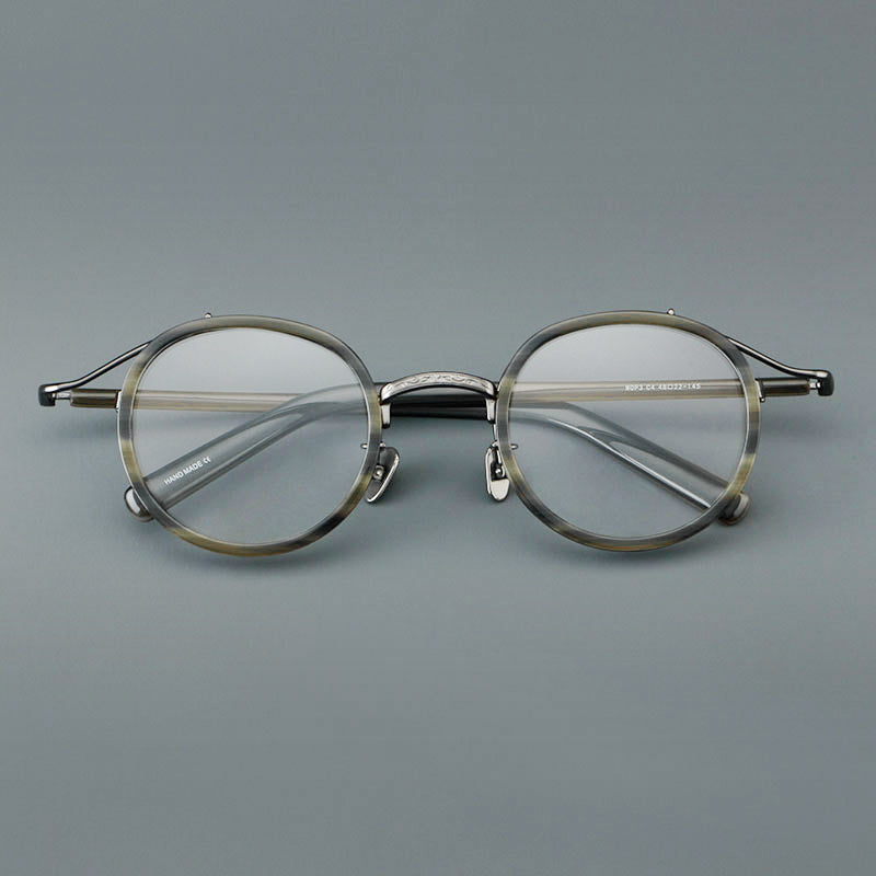 
Montura de gafas redondas retro de acetato con puente de metal fino y detalles laterales
