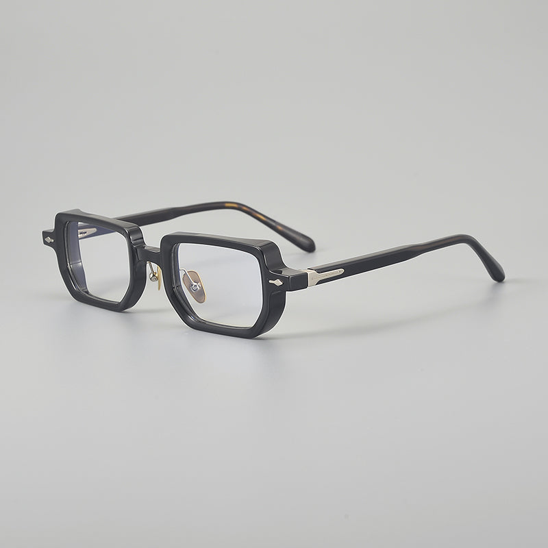 
Monturas de gafas rectangulares de acetato con línea superior ancha y bordes inferiores redondeados