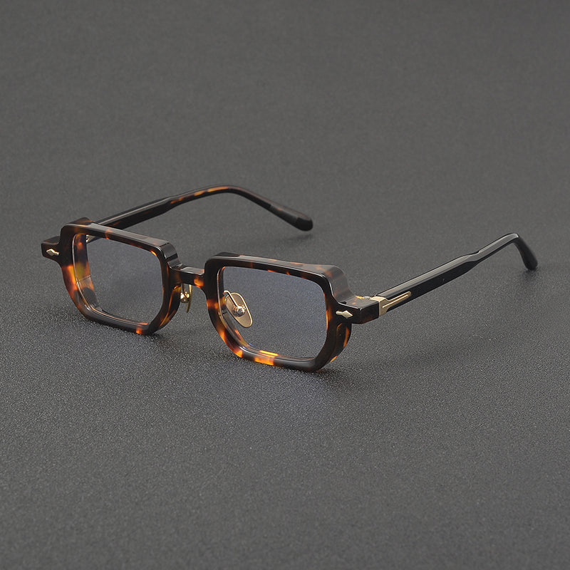 
Monturas de gafas rectangulares de acetato con línea superior ancha y bordes inferiores redondeados - Imagen 3