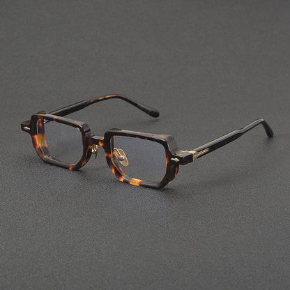 
Monturas de gafas rectangulares de acetato con línea superior ancha y bordes inferiores redondeados - Imagen 3