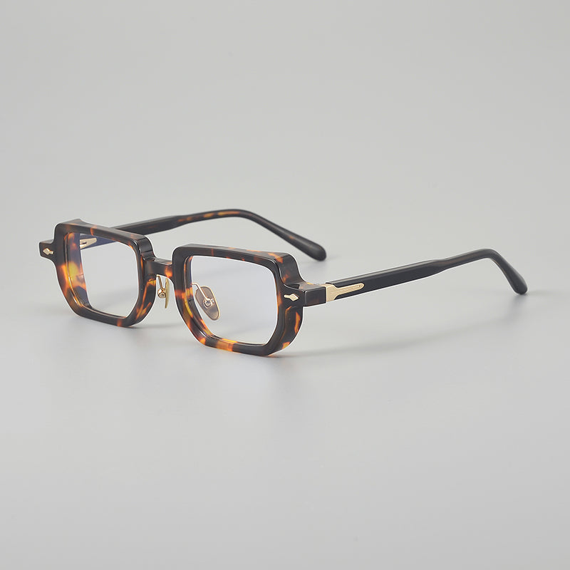 
Monturas de gafas rectangulares de acetato con línea superior ancha y bordes inferiores redondeados
