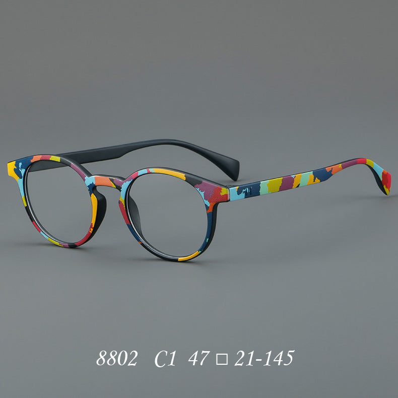 
Monturas de gafas estilo ojo de gato pintadas con patrones multicolores y esquinas elevadas