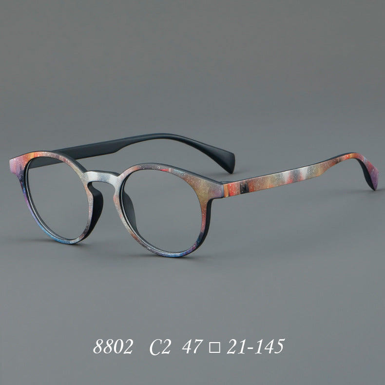 
Monturas de gafas estilo ojo de gato pintadas con patrones multicolores y esquinas elevadas