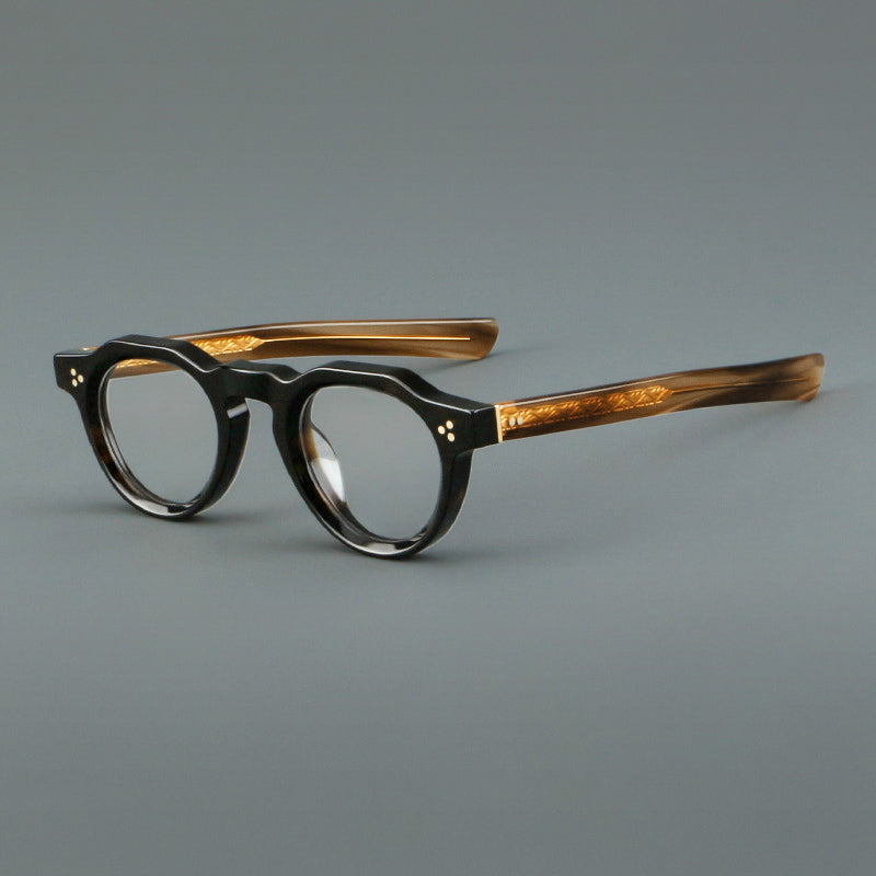 
Monturas de gafas vintage de acetato con forma geométrica, borde superior facetado y puente de cerradura - Negro y carey