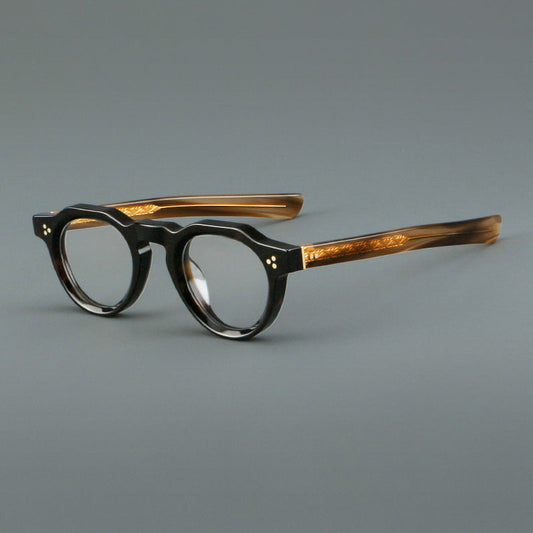 Monturas de gafas vintage de acetato con forma geométrica, borde superior facetado y puente de cerradura