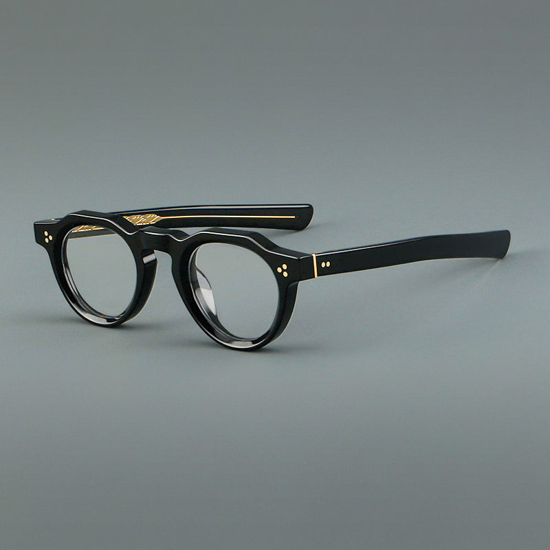 
Monturas de gafas vintage de acetato con forma geométrica, borde superior facetado y puente de cerradura - Negro