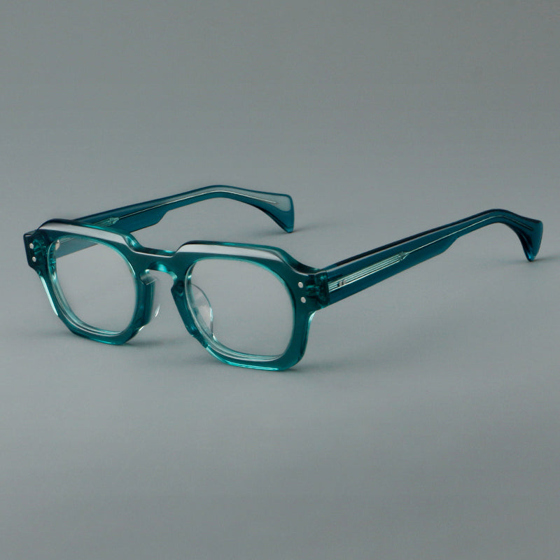 
Monturas de gafas retro cuadradas de acetato con bordes gruesos esculpidos y remaches en las esquinas - Verde azulado