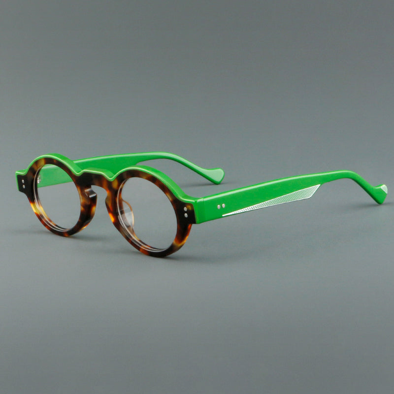 
Montura de gafas retro ovalada de acetato, aros completos profundos y varillas anchas