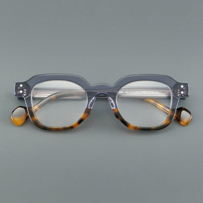
Monturas de gafas geométricas cuadradas de acetato con línea superior escalonada y detalles de remaches - Imagen 7