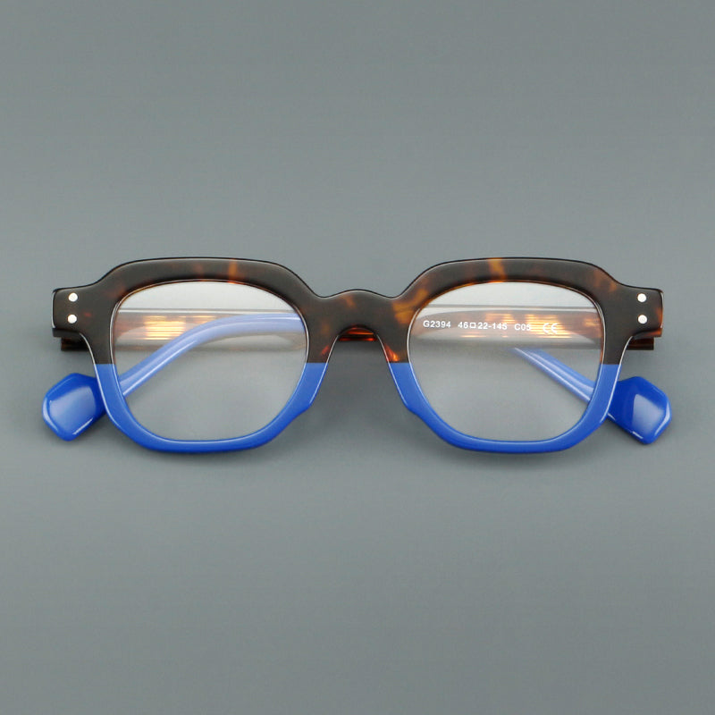 
Monturas de gafas geométricas cuadradas de acetato con línea superior escalonada y detalles de remaches - Imagen 12