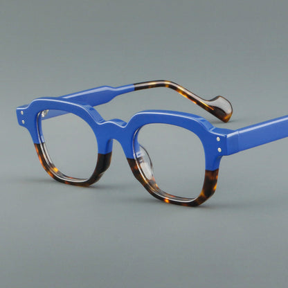 
Monturas de gafas geométricas cuadradas de acetato con línea superior escalonada y detalles de remaches - Imagen 15