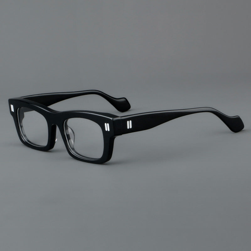 
Monturas de gafas retro rectangulares de acetato con cejas gruesas y detalles de doble barra en las esquinas