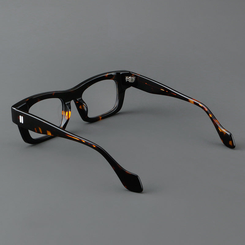 
Monturas de gafas retro rectangulares de acetato con cejas gruesas y detalles de doble barra en las esquinas - Imagen 9