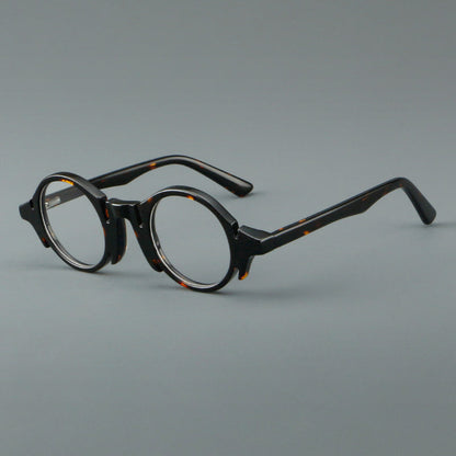 
Montura de gafas redondas de acetato con efecto de madera, frente esculpido y patillas moldeadas - Imagen 3