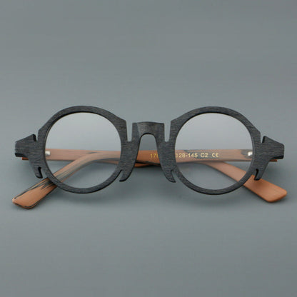 
Montura de gafas redondas de acetato con efecto de madera, frente esculpido y patillas moldeadas - Imagen 4
