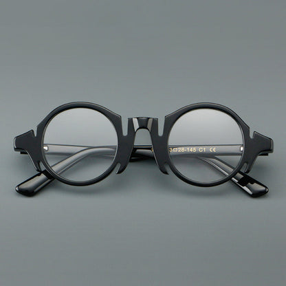 
Montura de gafas redondas de acetato con efecto de madera, frente esculpido y patillas moldeadas - Imagen 5