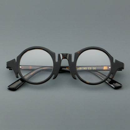 
Montura de gafas redondas de acetato con efecto de madera, frente esculpido y patillas moldeadas - Imagen 6