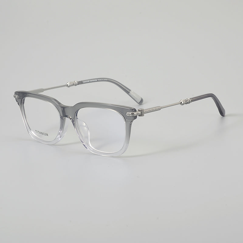 
Monturas de gafas retro cuadradas redondeadas con aros completos y detalles metálicos en las esquinas