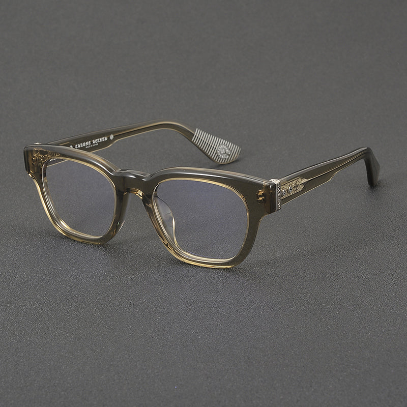 
Monturas de gafas rectangulares de acetato y titanio con esquinas redondeadas y detalles estampados en las varillas - Imagen 2