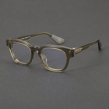 
Monturas de gafas rectangulares de acetato y titanio con esquinas redondeadas y detalles estampados en las varillas - Imagen 2