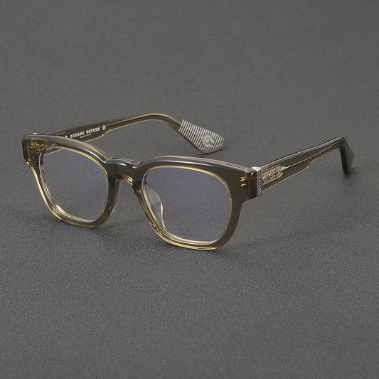 Monturas de gafas rectangulares de acetato y titanio con esquinas redondeadas y detalles estampados en las varillas